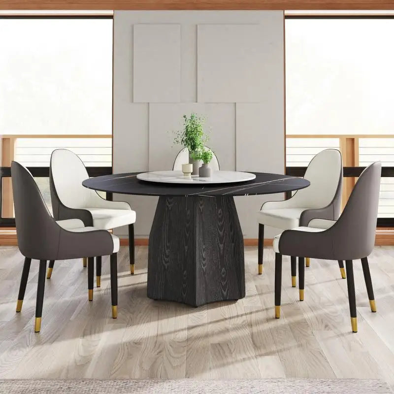 The Songbird Round Marble Dining Table with Black Textured Wood Base