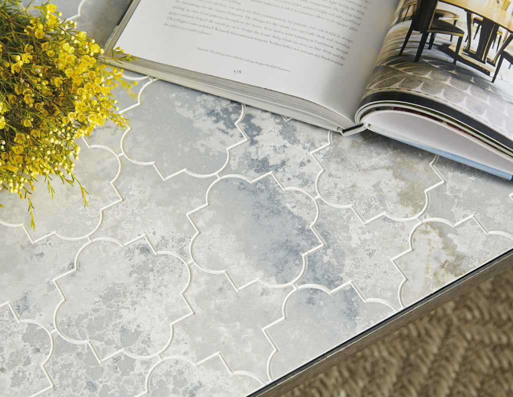 The Silva Alfresco Lapilli Carved Top Cocktail Table