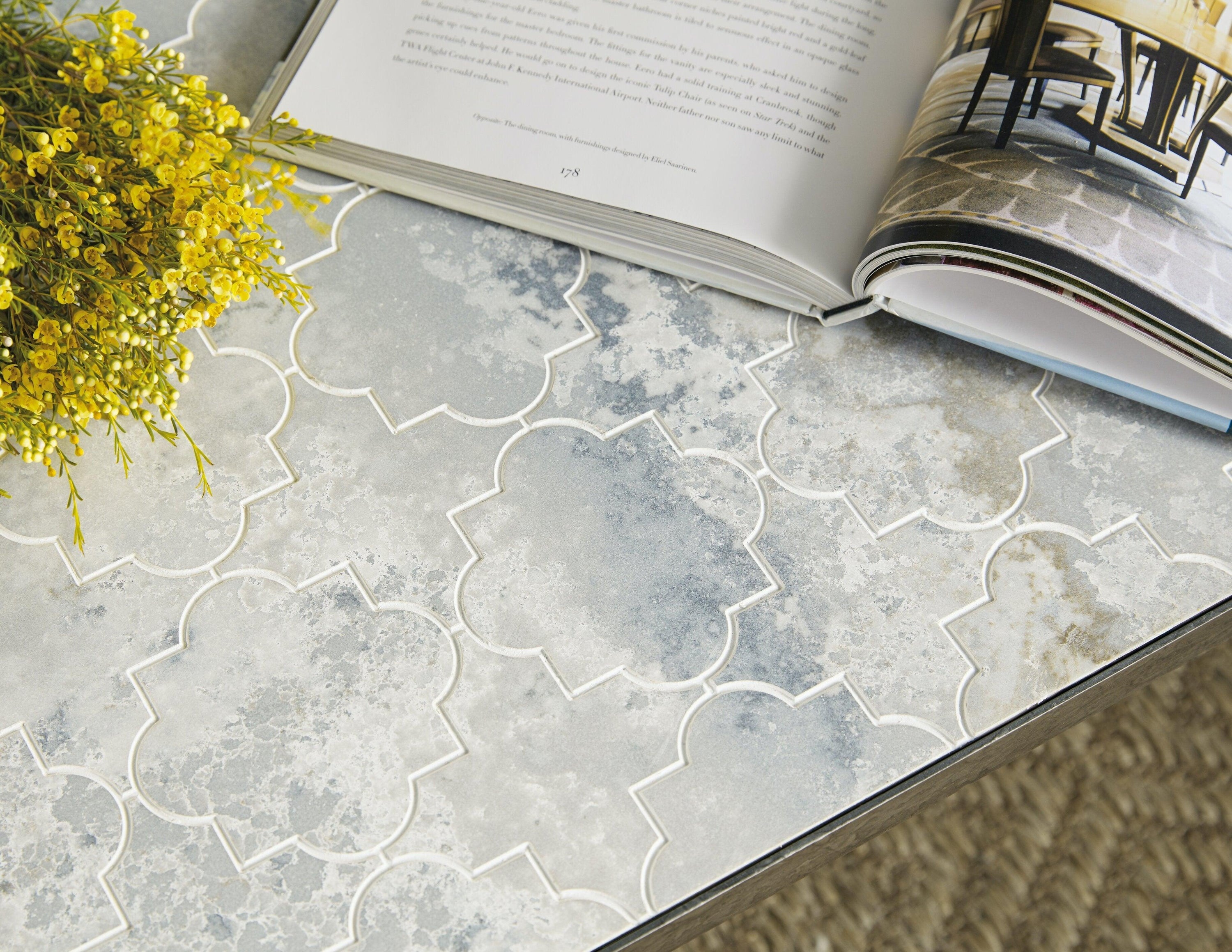 The Silva Alfresco Lapilli Carved Top Cocktail Table